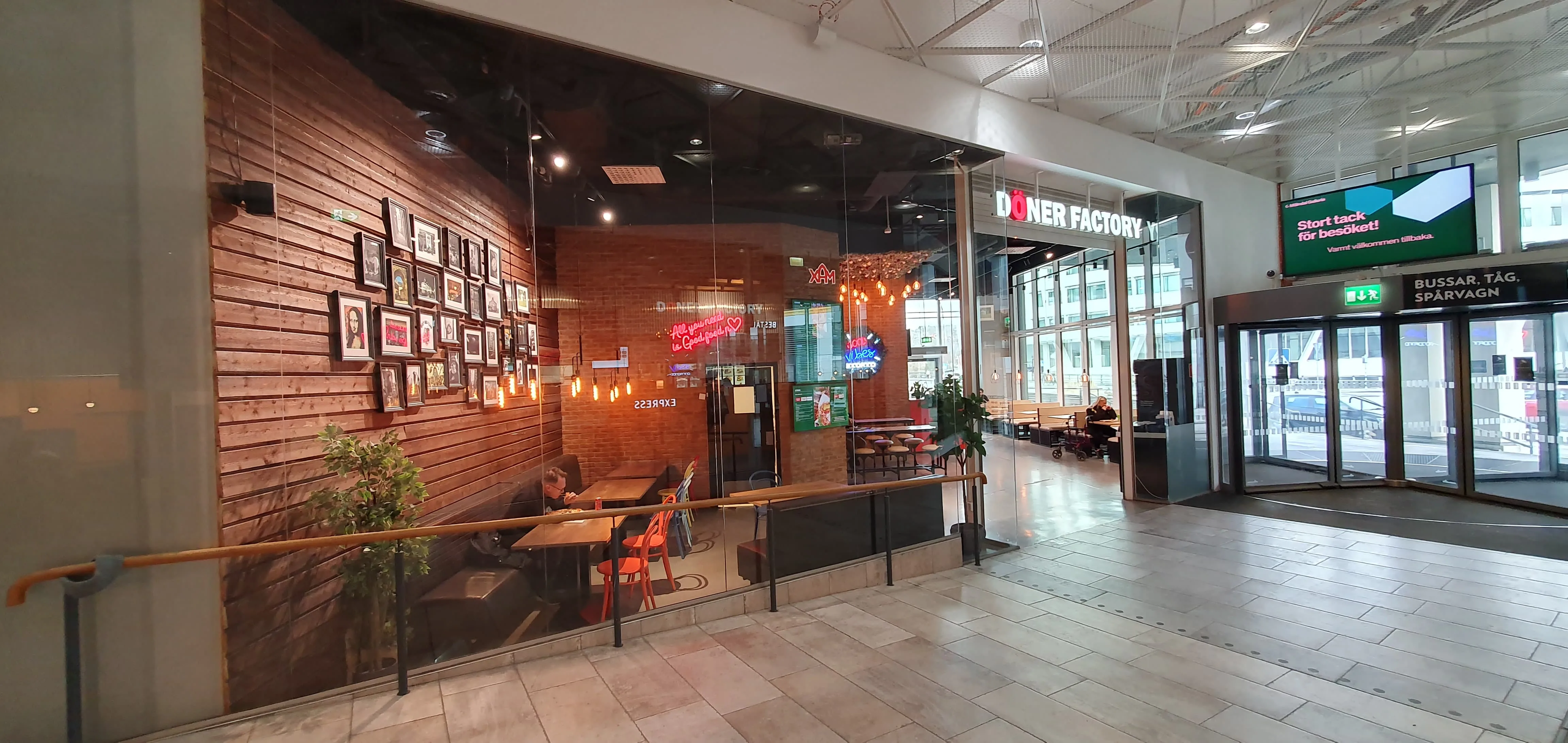 Wide view of the Doner Factory seating area and upper level interior.